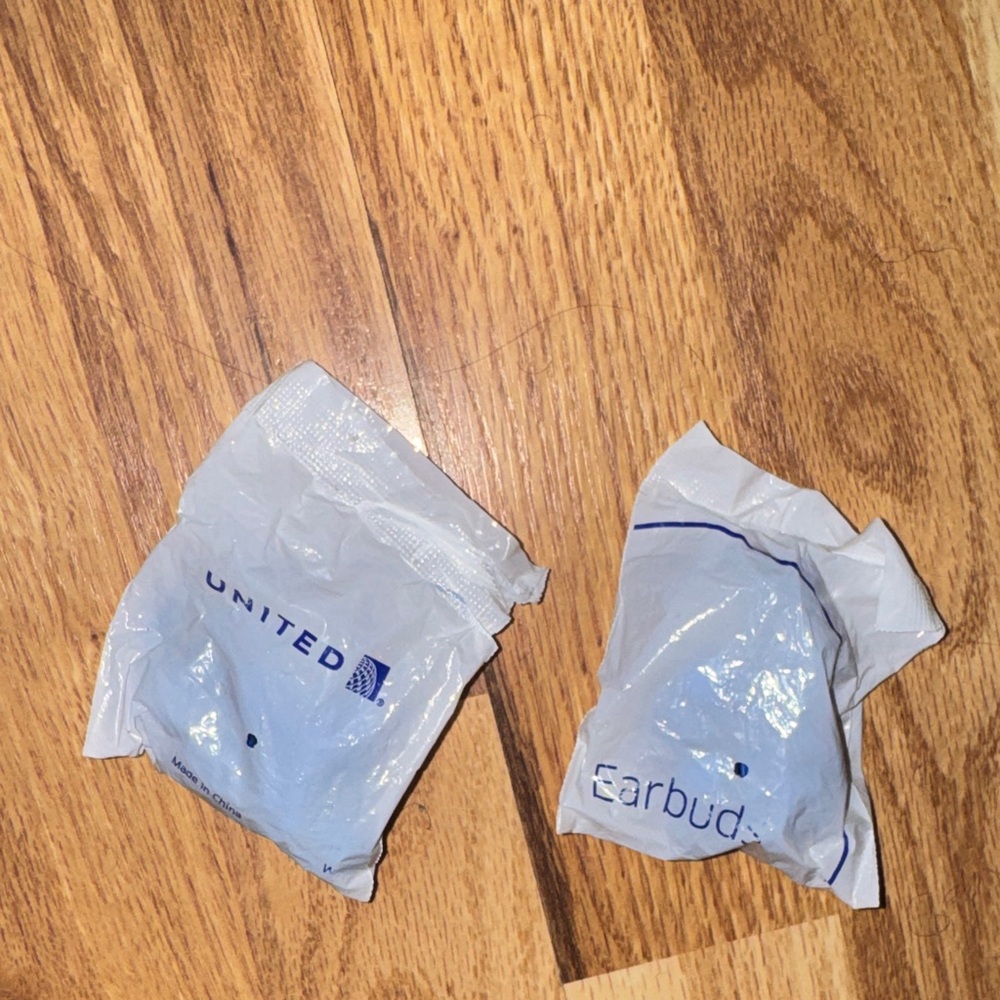United airlines 2 pairs earbuds sealed brand new
